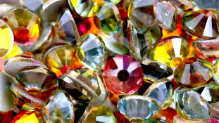 Close-up of multicolored rhinestones with a vibrant mix of colors.