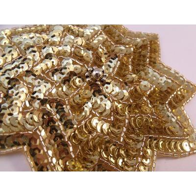 A - 098: large star shape applique, gold. - Aleemahs