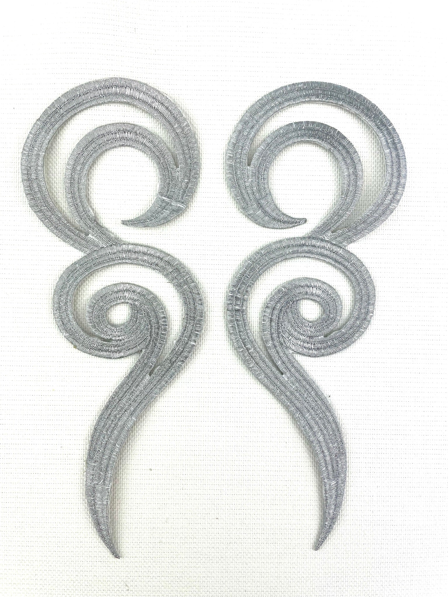 EMB - 038: Large swirl pair, silver. - Aleemahs
